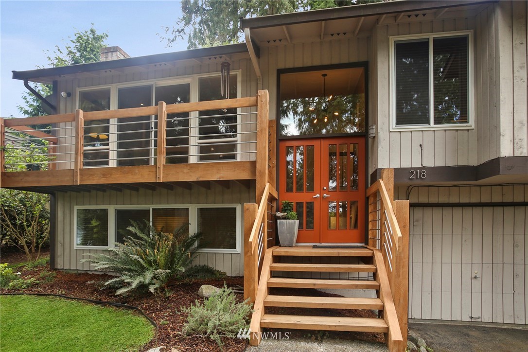 218 221st Street Southwest Bothell, WA 98021 - Photo 3 of 40 a view of a house with a window and front door