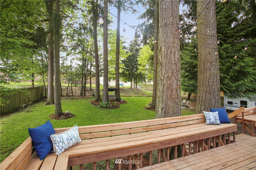 218 221st Street Southwest Bothell, WA 98021 - Photo 29 of 40 a view of a wooden deck and garden