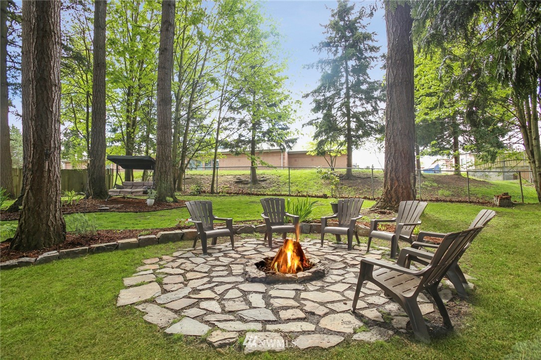 218 221st Street Southwest Bothell, WA 98021 - Photo 31 of 40 a garden view with a seating space