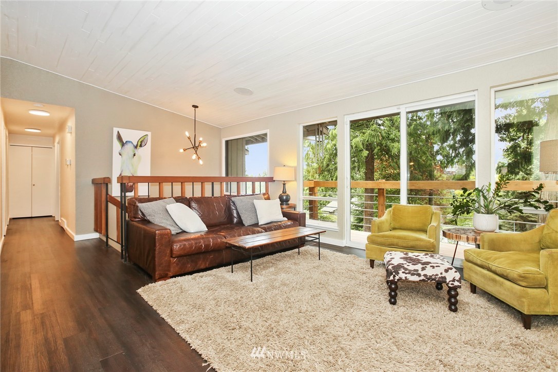 218 221st Street Southwest Bothell, WA 98021 - Photo 6 of 40 a living room with furniture and a large window