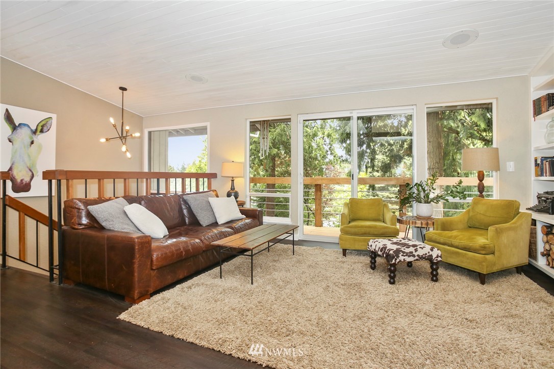 218 221st Street Southwest Bothell, WA 98021 - Photo 7 of 40 a living room with furniture and a large window