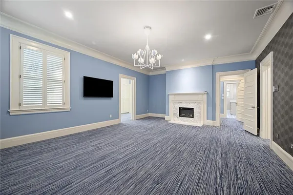a view of hallway with wooden floor