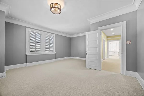 wooden floor and a bathroom with a sink