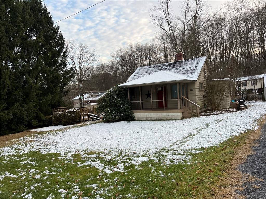 263 Whitestown Road Butler, PA 16001 - Photo 1 of 44 a front view of a house with a yard
