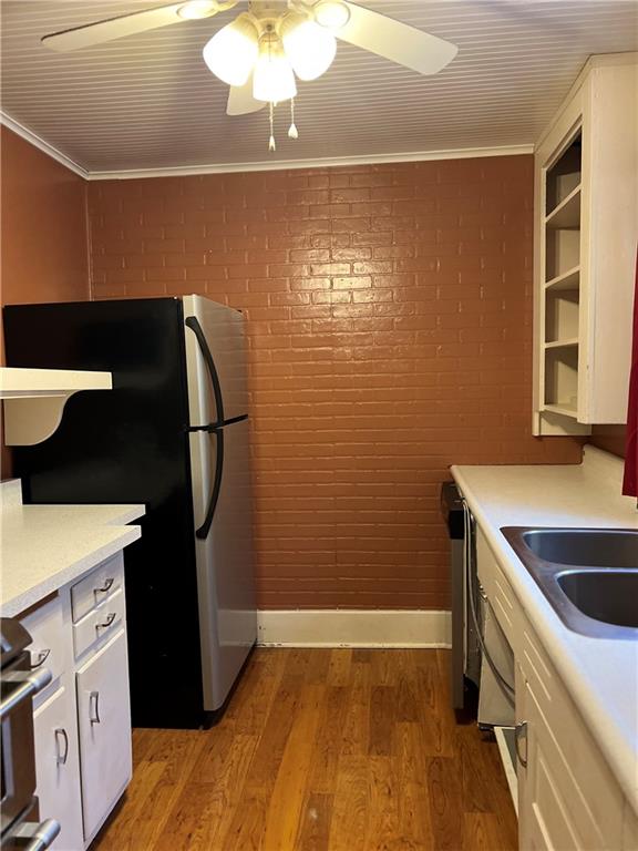 263 Whitestown Road Butler, PA 16001 - Photo 16 of 44 a kitchen with a sink and a refrigerator