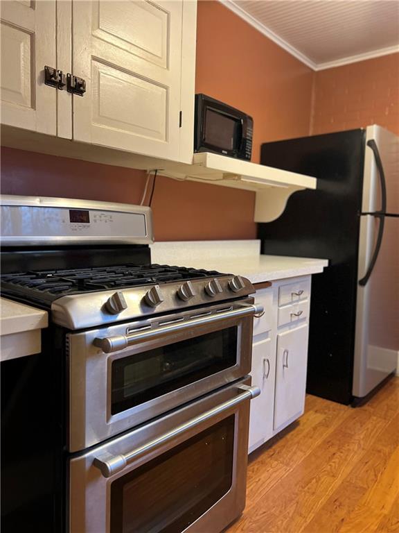 263 Whitestown Road Butler, PA 16001 - Photo 18 of 44 a stove top oven sitting inside of a kitchen