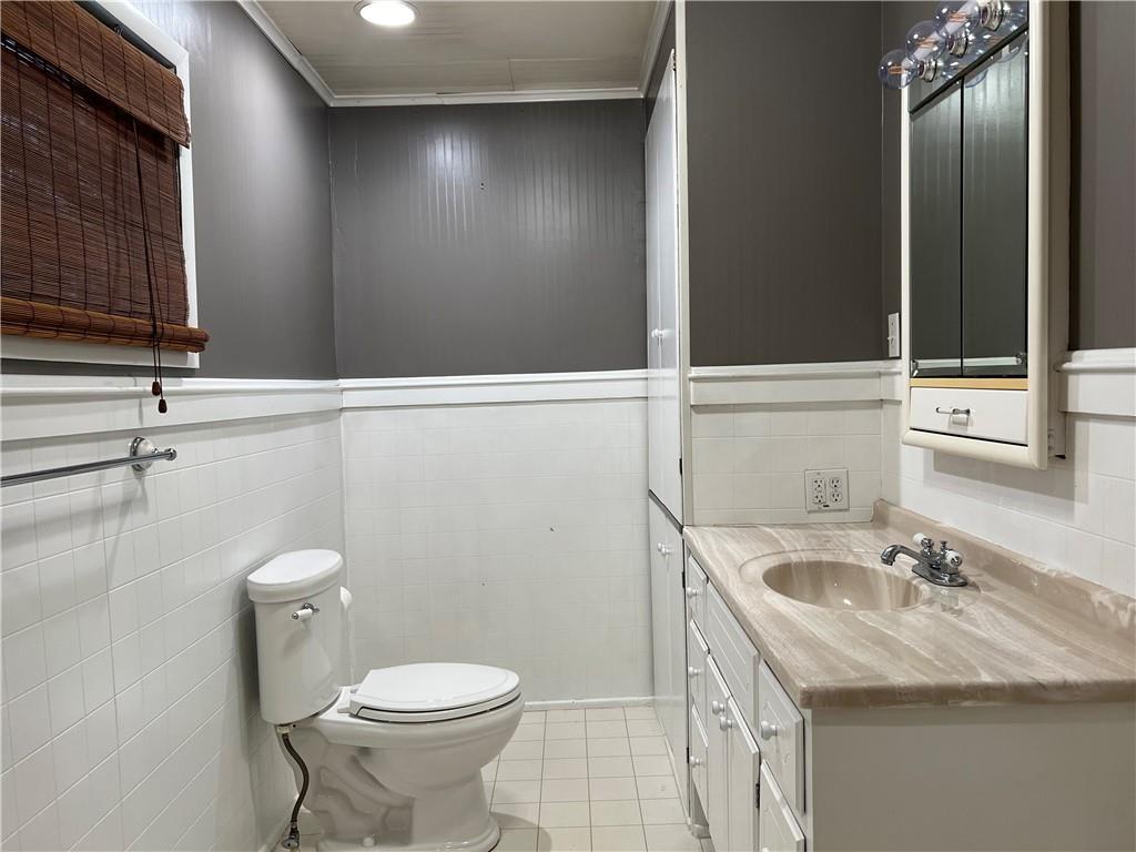 263 Whitestown Road Butler, PA 16001 - Photo 25 of 44 a bathroom with a sink toilet and mirror
