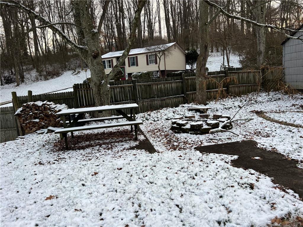 263 Whitestown Road Butler, PA 16001 - Photo 36 of 44 a view of backyard with wooden fence and trees