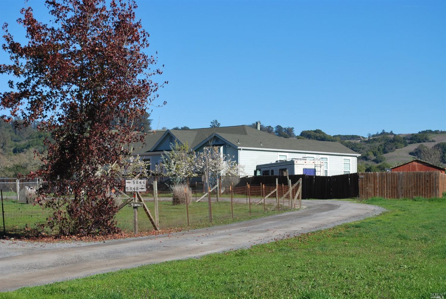 5850 Petaluma Hill Road Santa Rosa, CA 95404 - Photo 1 of 1 front view of a house with a yard