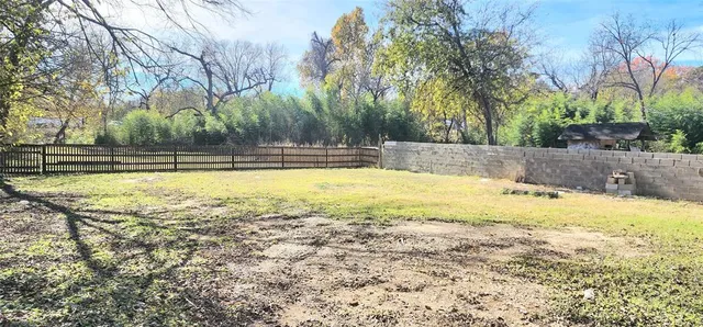 a view of a swimming pool with trees