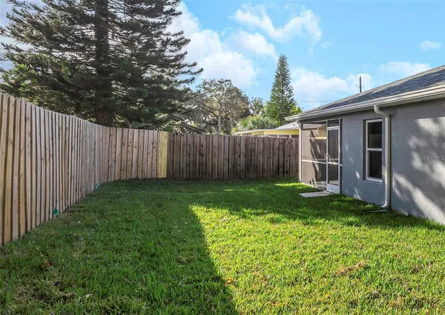a view of a backyard with a garden