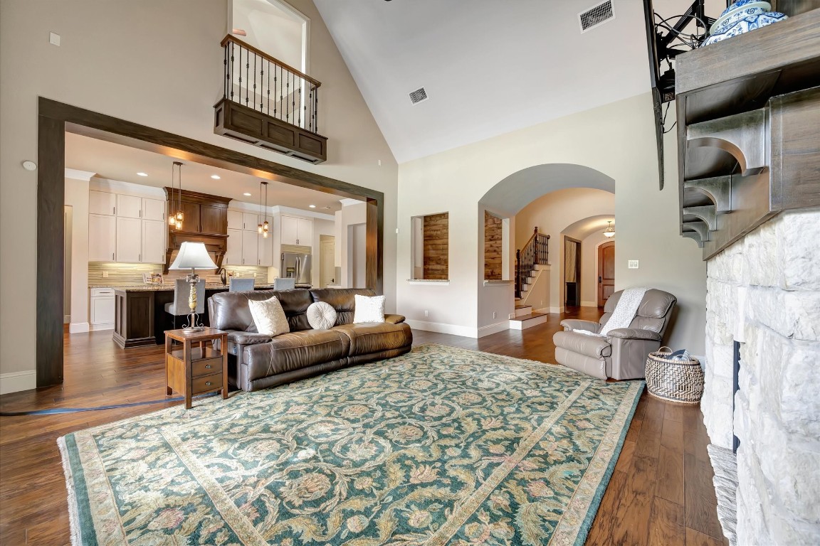 3108 Tyler Court Friendswood, TX 77546 - Photo 11 of 50 a living room with furniture and a chandelier