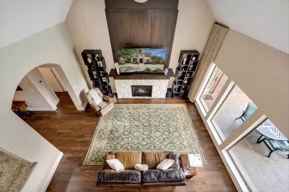 3108 Tyler Court Friendswood, TX 77546 - Photo 12 of 50 a living room with furniture and a fireplace