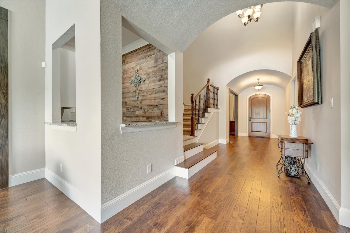 3108 Tyler Court Friendswood, TX 77546 - Photo 13 of 50 a view of a living room and entryway with wooden floor