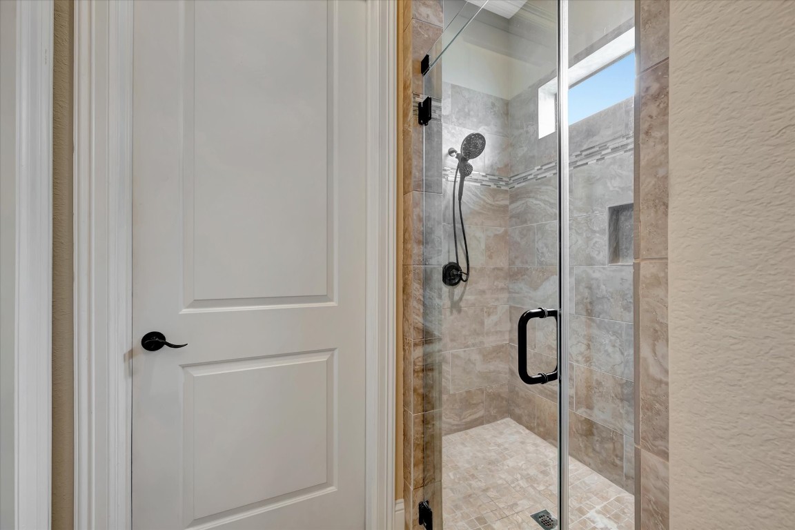 3108 Tyler Court Friendswood, TX 77546 - Photo 22 of 50 a bathroom with a shower
