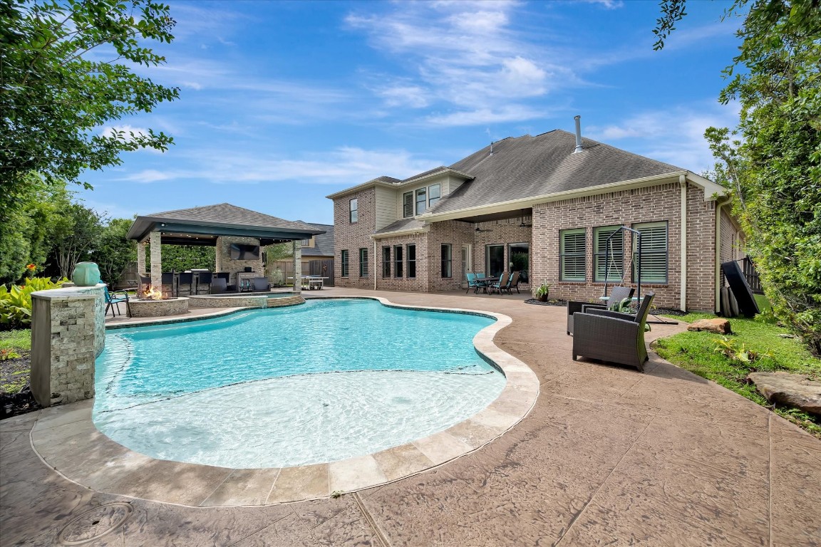 3108 Tyler Court Friendswood, TX 77546 - Photo 43 of 50 front view of a house with a yard