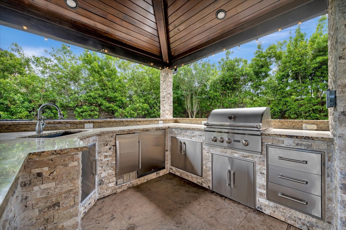 3108 Tyler Court Friendswood, TX 77546 - Photo 45 of 50 a view of a kitchen with a sink and dishwasher