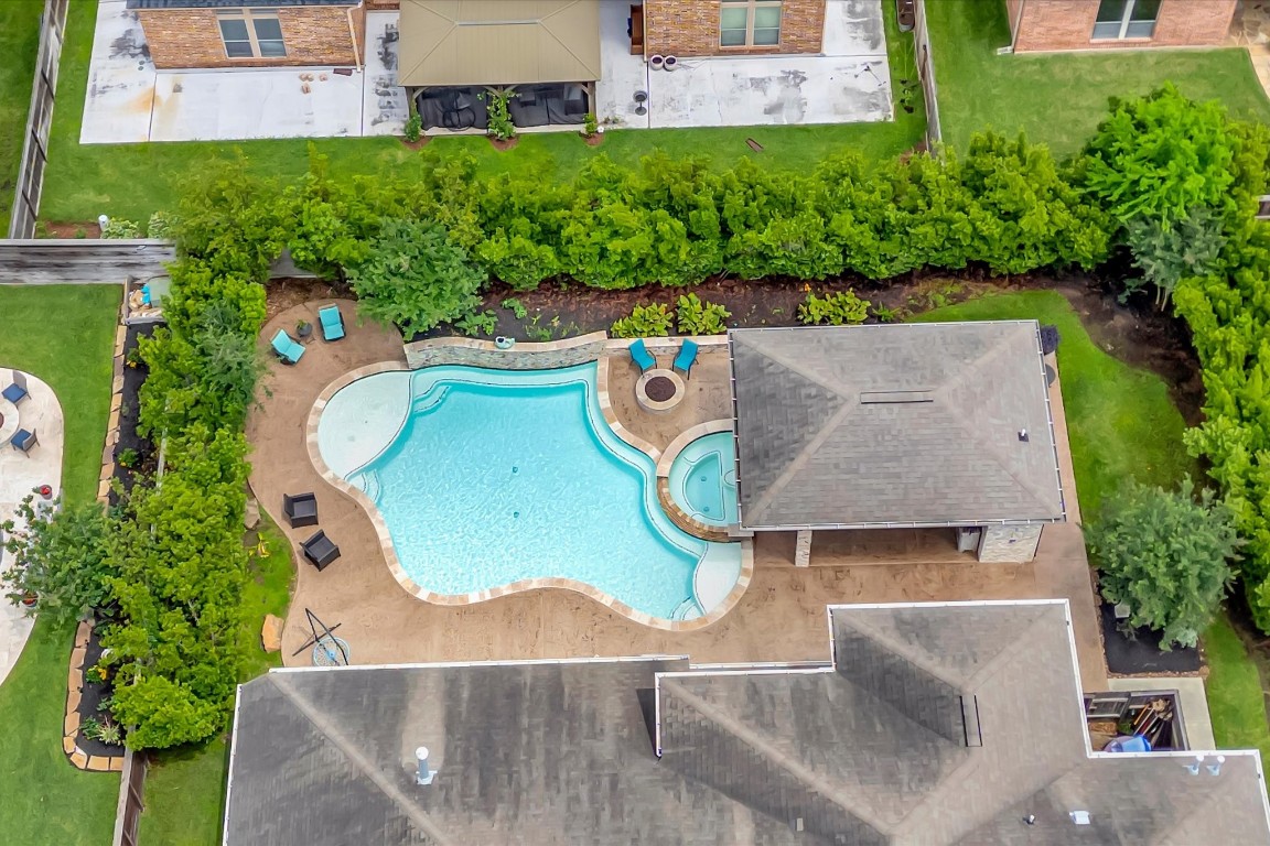 3108 Tyler Court Friendswood, TX 77546 - Photo 46 of 50 an aerial view of a house with yard swimming pool and outdoor seating