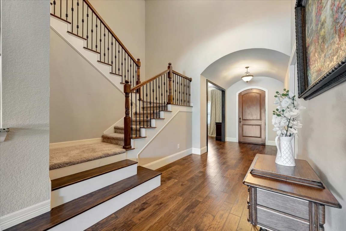 3108 Tyler Court Friendswood, TX 77546 - Photo 7 of 50 a view of entryway and hall with wooden floor