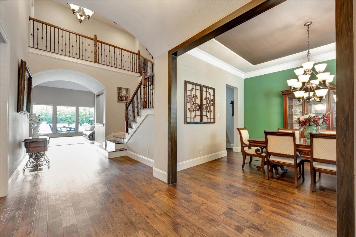 3108 Tyler Court Friendswood, TX 77546 - Photo 8 of 50 a view of a dining room with furniture window and wooden floor