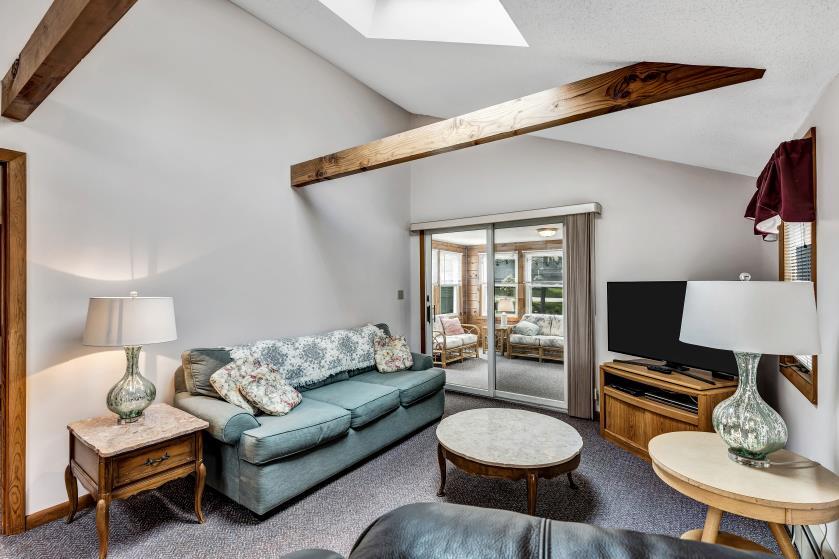 9 Uncle Henrys Road Mashpee, MA 02649 - Photo 20 of 41 a living room with furniture and a wooden floor