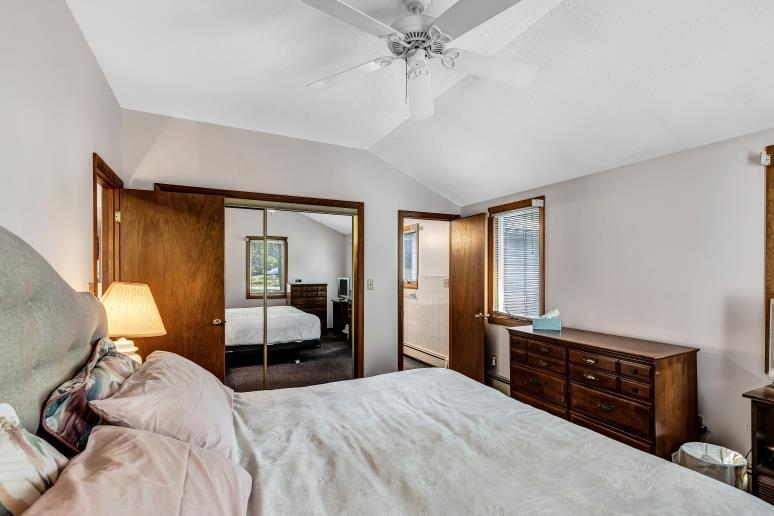 9 Uncle Henrys Road Mashpee, MA 02649 - Photo 29 of 41 a bedroom with a bed and wooden floor