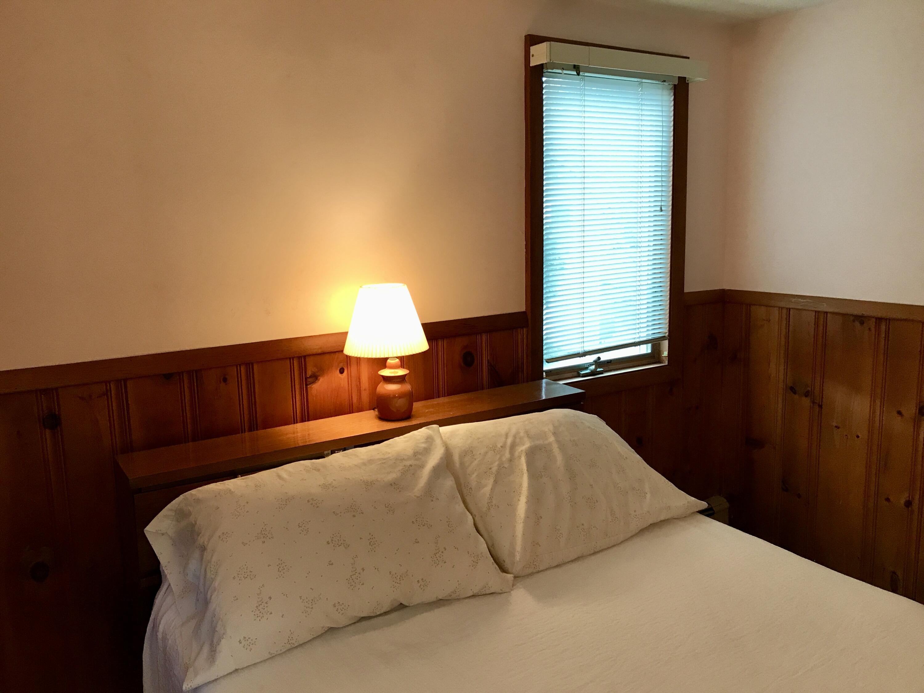 9 Uncle Henrys Road Mashpee, MA 02649 - Photo 33 of 41 a bedroom with a bed and a night stand