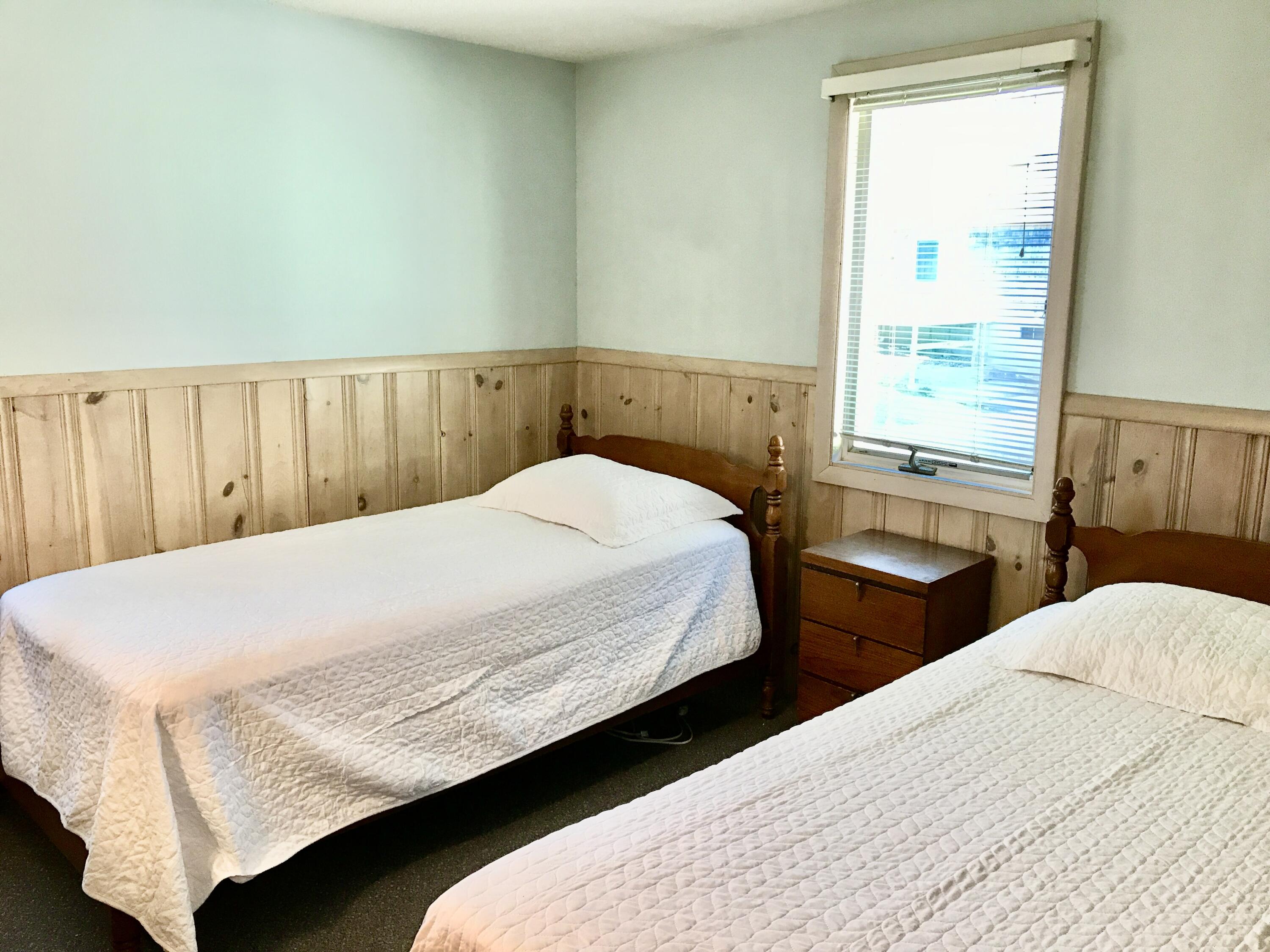 9 Uncle Henrys Road Mashpee, MA 02649 - Photo 38 of 41 a bedroom with a bed and window