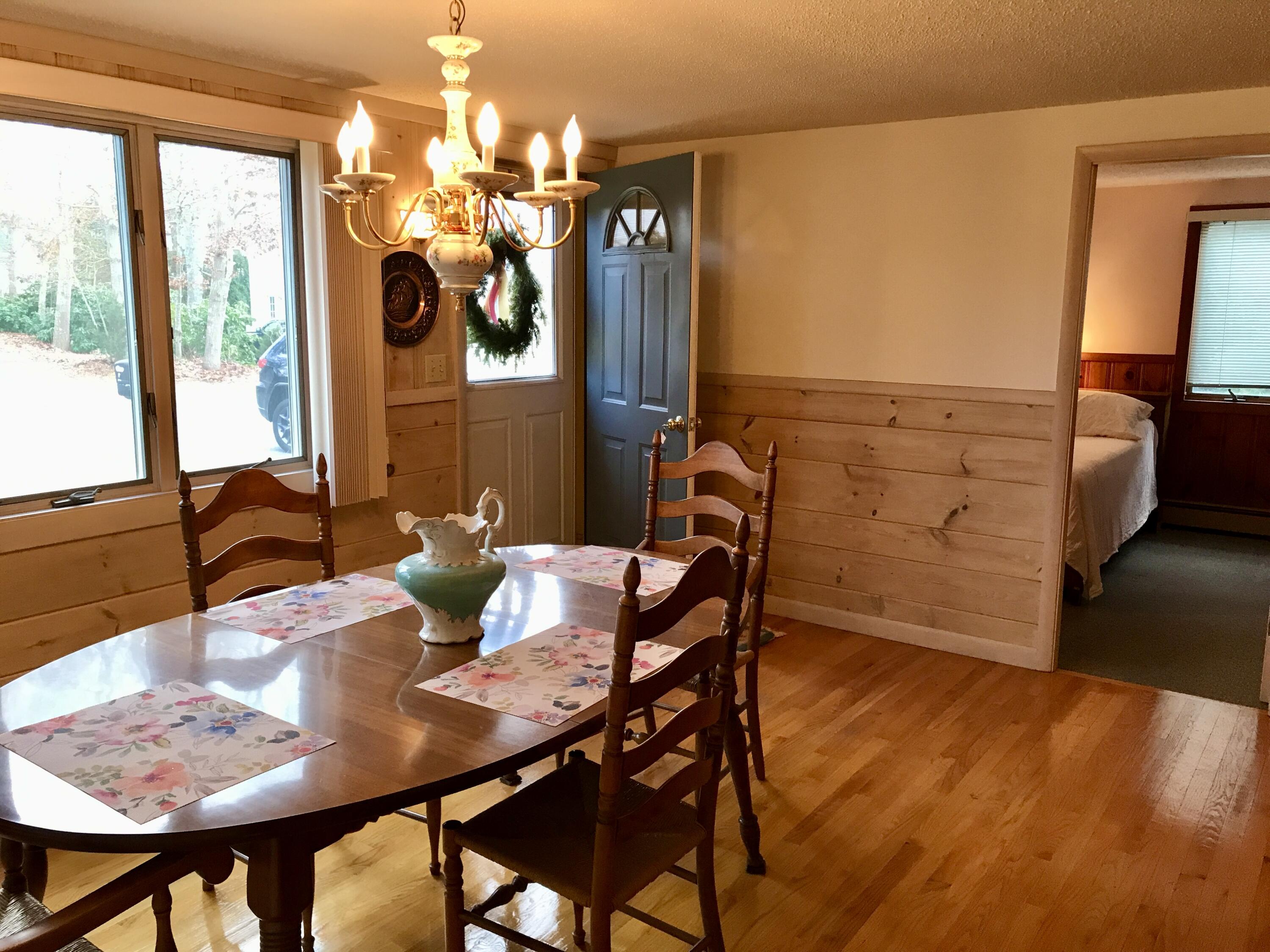 9 Uncle Henrys Road Mashpee, MA 02649 - Photo 5 of 41 a view of a dining room with furniture and window
