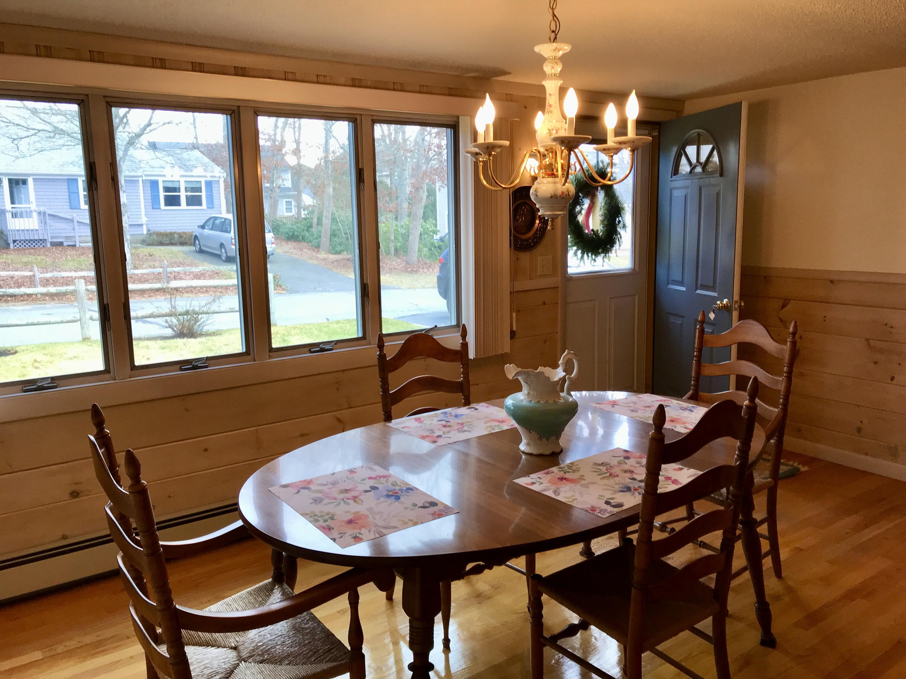 9 Uncle Henrys Road Mashpee, MA 02649 - Photo 8 of 41 a view of a dining room with furniture and window