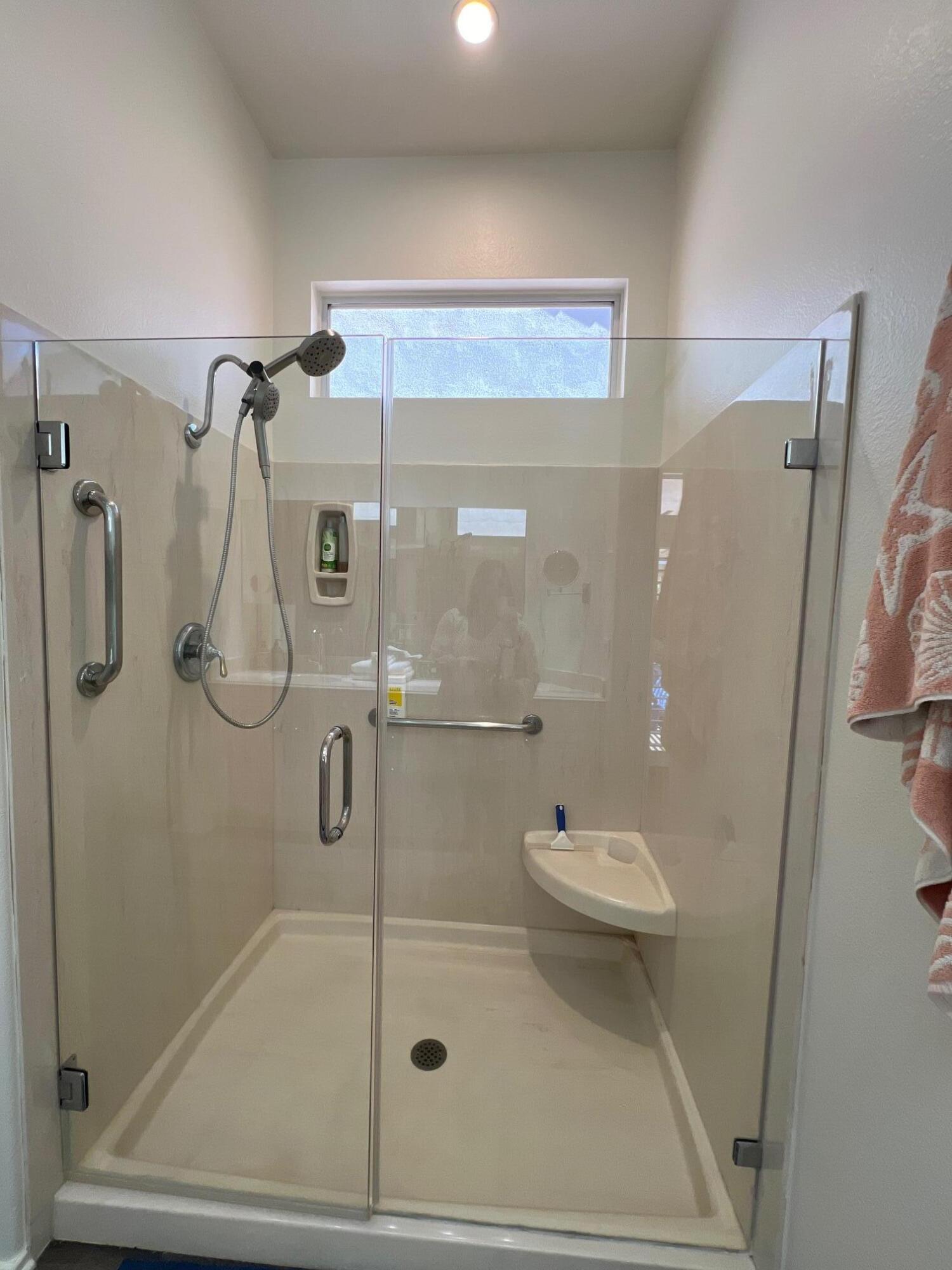 78119 Elenbrook Court Palm Desert, CA 92211 - Photo 17 of 25 a bathroom with a shower and a toilet