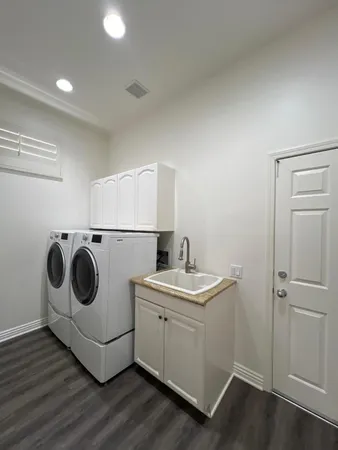 a room with furniture and painting on the wall