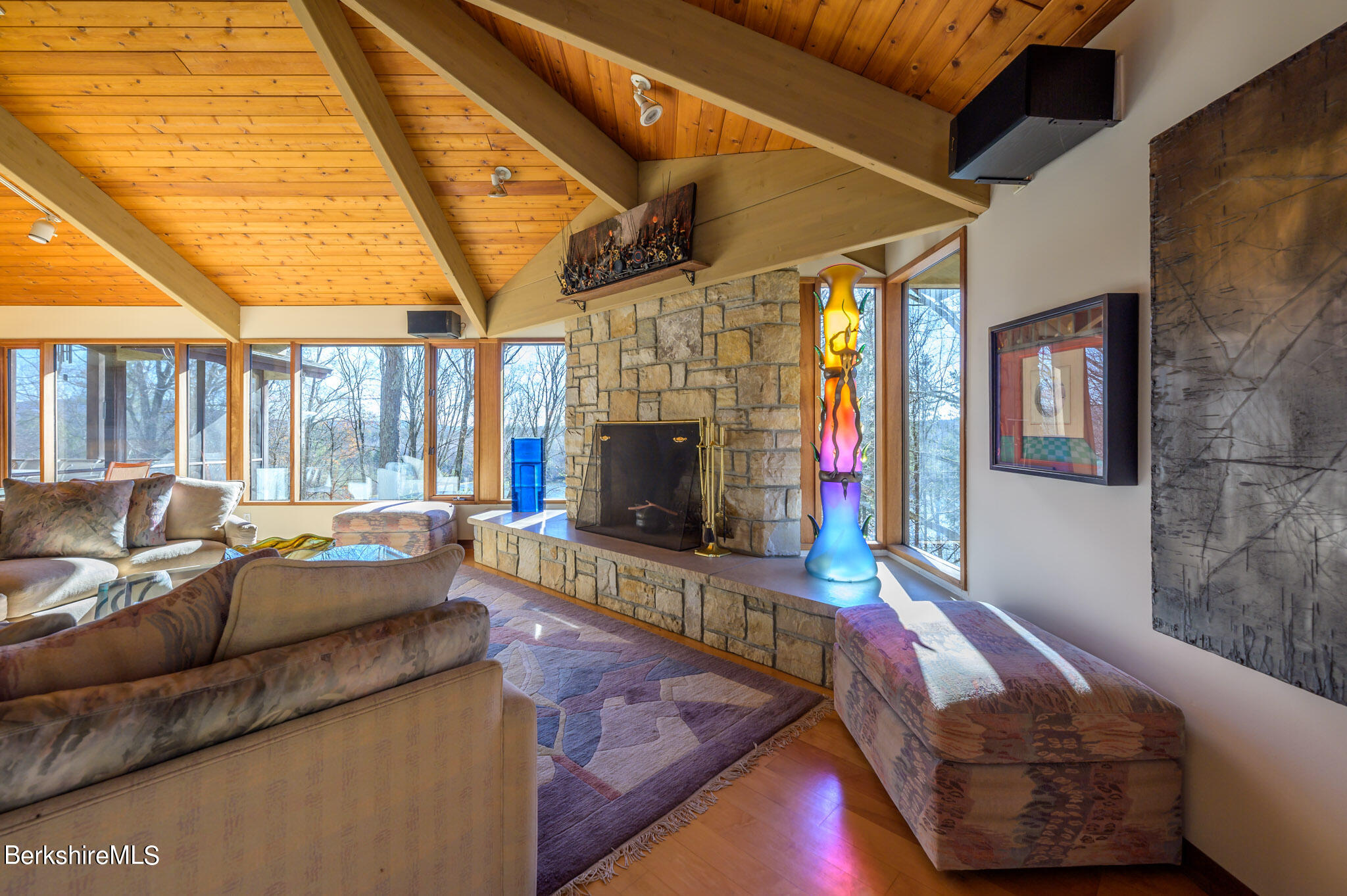 140 Main Road Monterey, MA 01230 - Photo 10 of 48 a living room with furniture and a fireplace