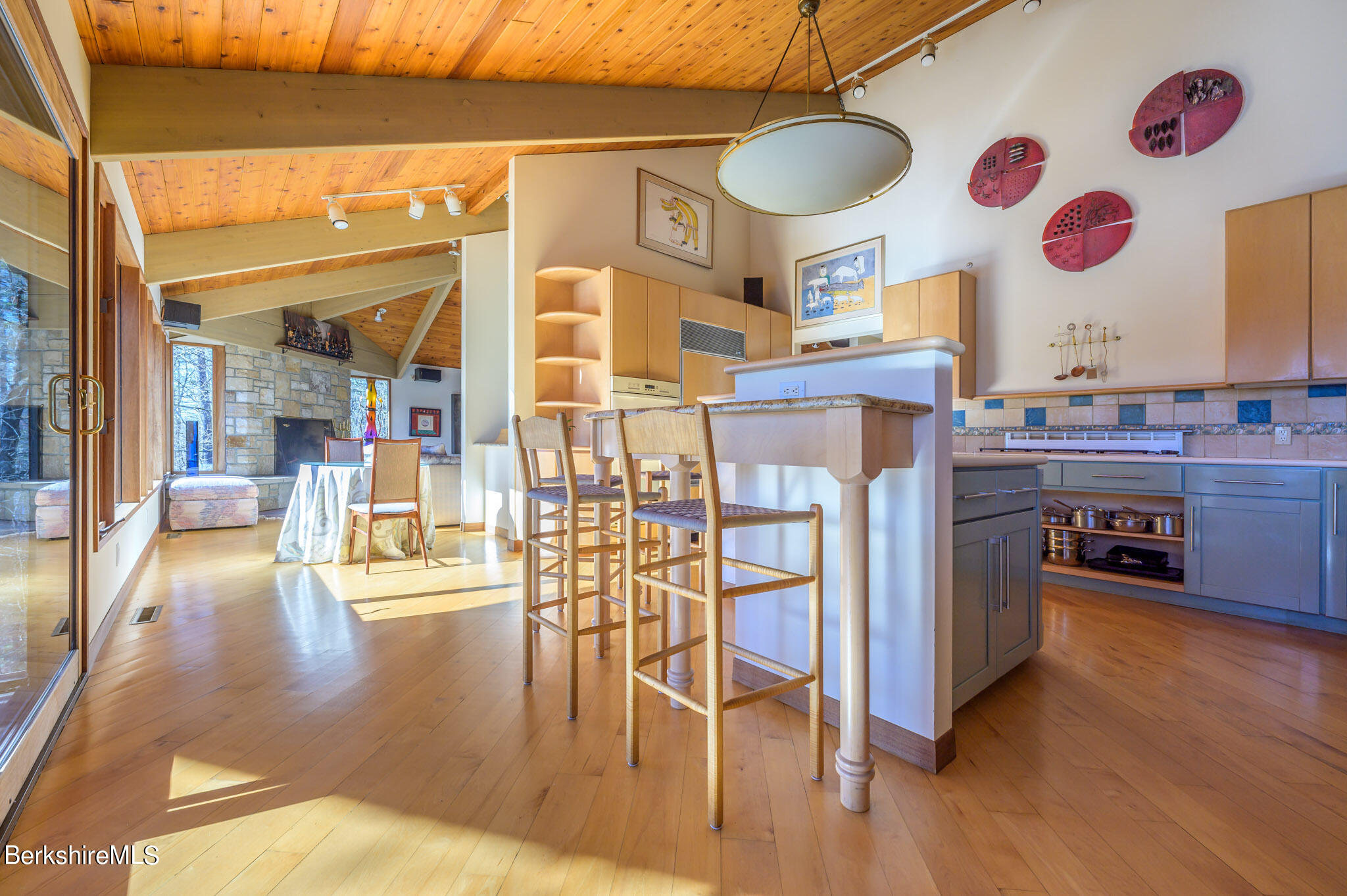 140 Main Road Monterey, MA 01230 - Photo 12 of 48 a kitchen with stainless steel appliances granite countertop a stove and a dining table with kitchen view