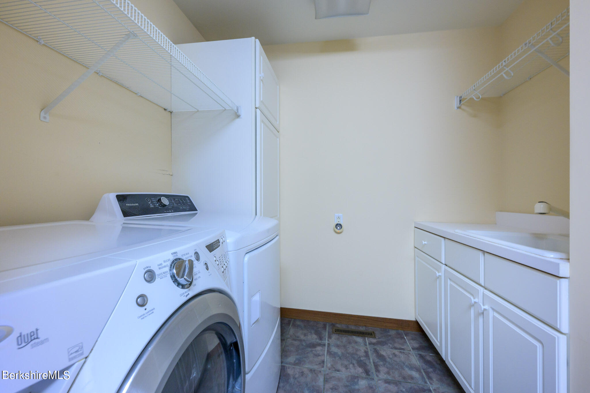 140 Main Road Monterey, MA 01230 - Photo 17 of 48 a utility room with dryer and washer