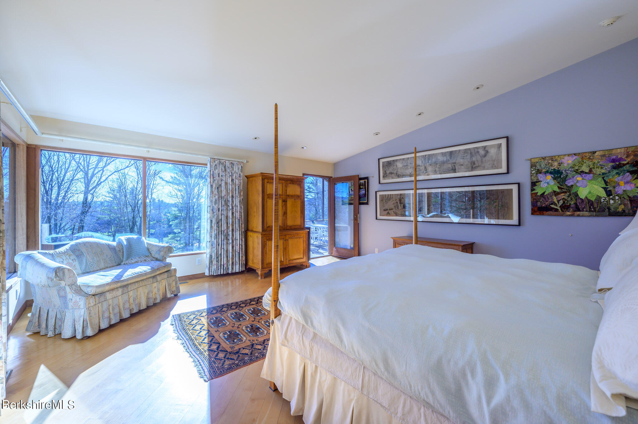 140 Main Road Monterey, MA 01230 - Photo 18 of 48 a bedroom with a bed couch and a large window