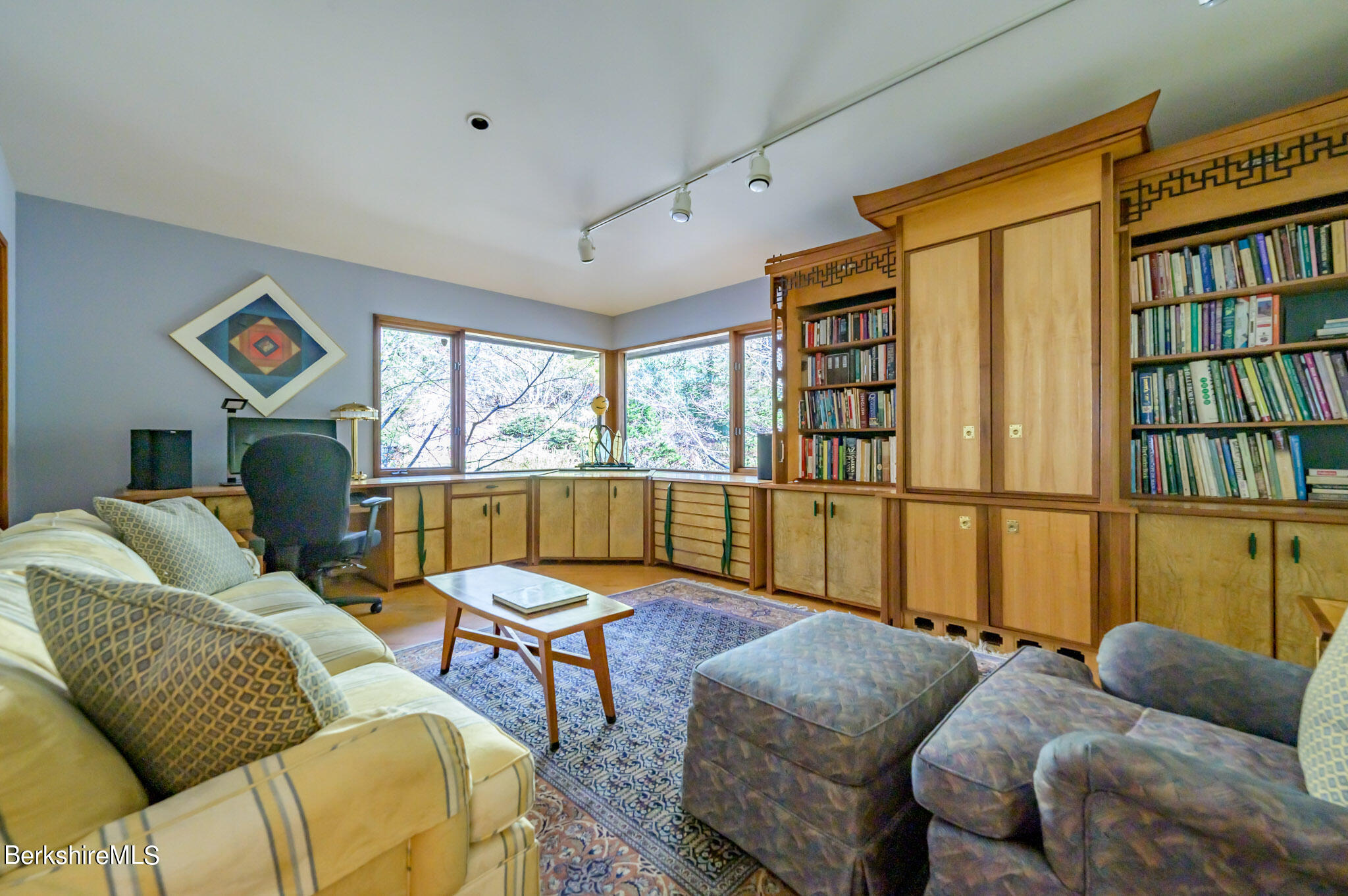 140 Main Road Monterey, MA 01230 - Photo 22 of 48 a living room with furniture or couch and a large window