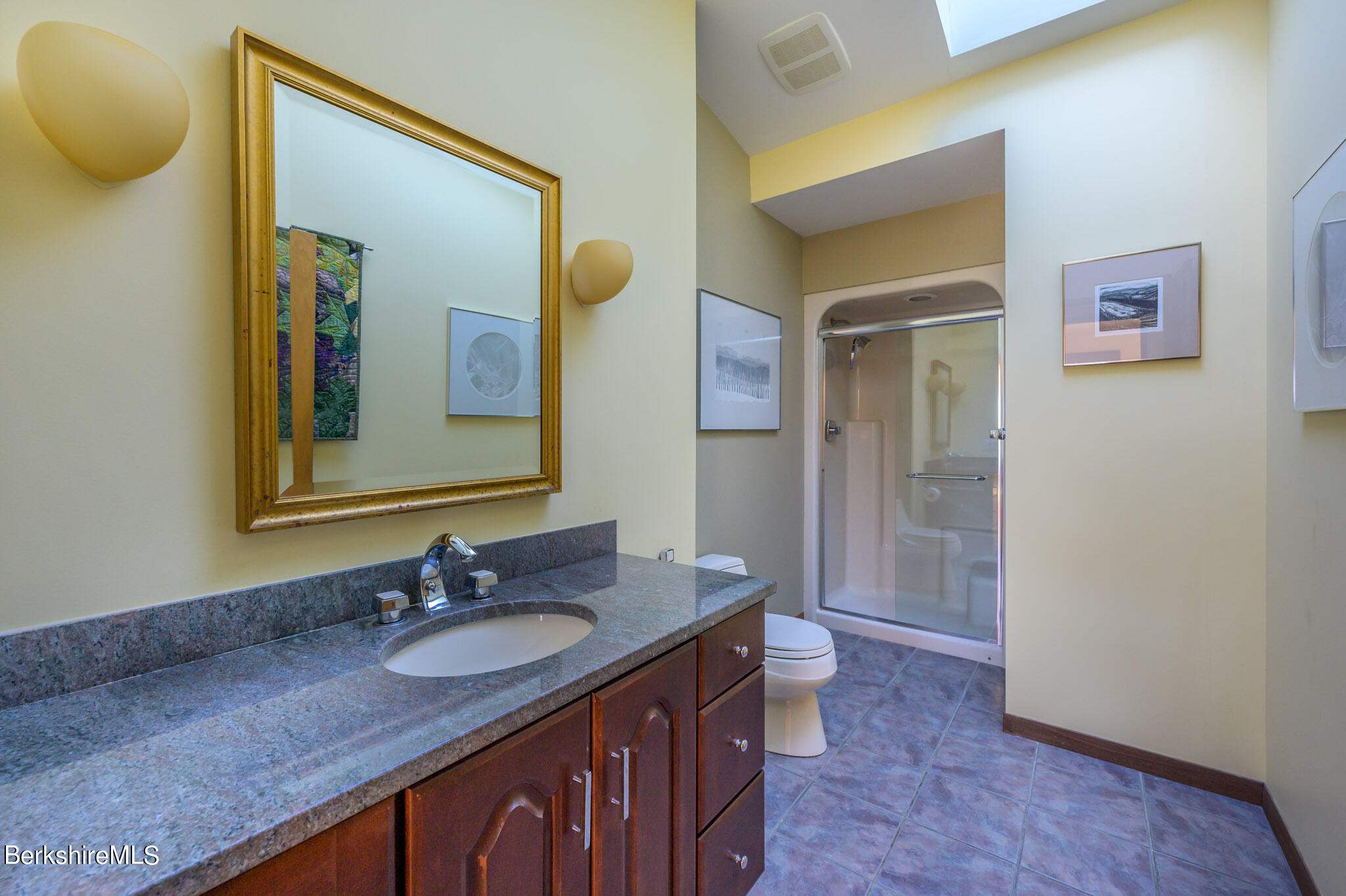 140 Main Road Monterey, MA 01230 - Photo 25 of 48 a bathroom with a granite countertop sink and a mirror