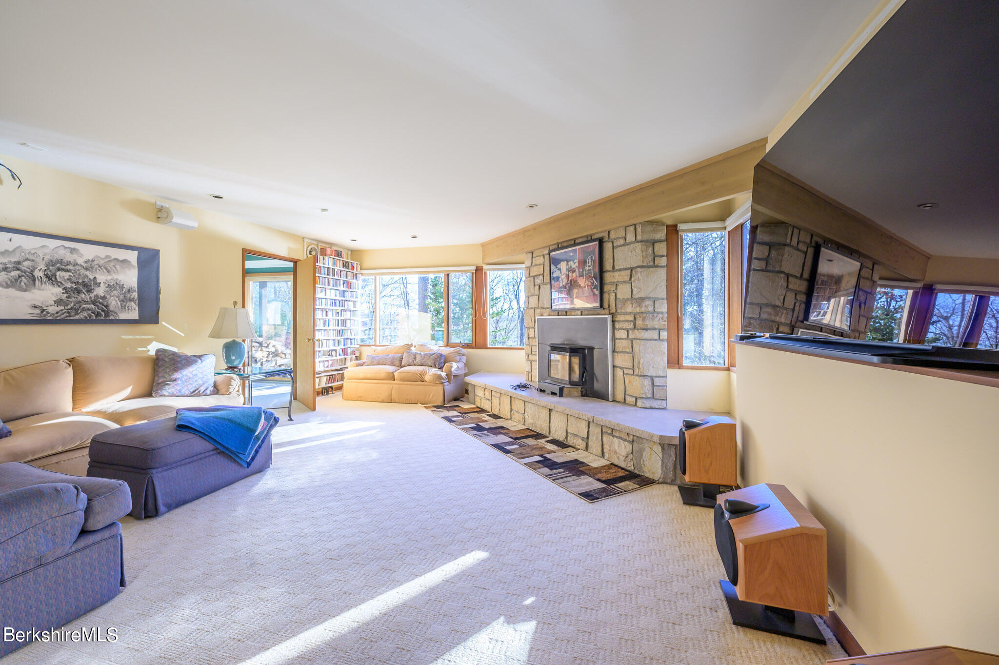 140 Main Road Monterey, MA 01230 - Photo 27 of 48 a living room with furniture and a large window