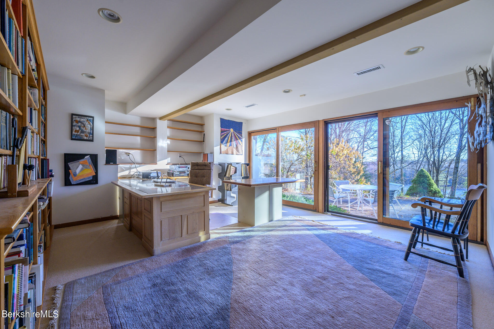 140 Main Road Monterey, MA 01230 - Photo 37 of 48 a living room with furniture and a floor to ceiling window