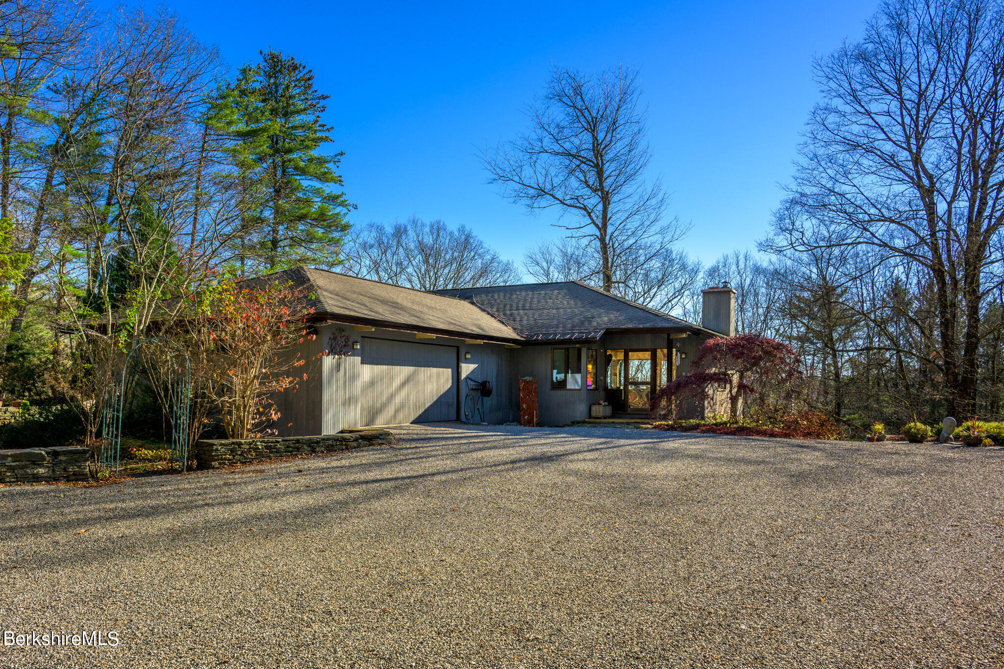 140 Main Road Monterey, MA 01230 - Photo 6 of 48 a view of a house with a yard