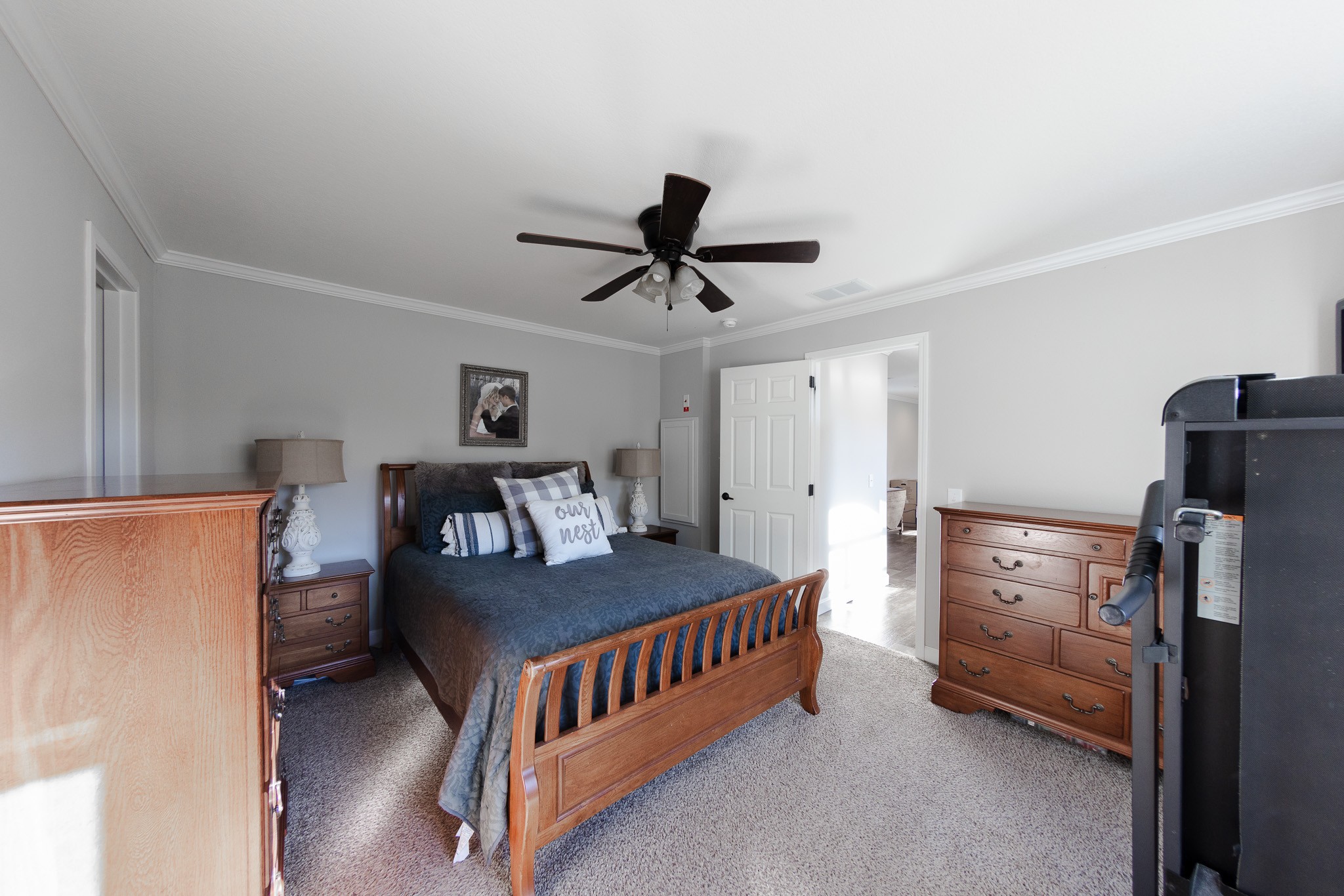 307 Swiss Colony Road Hohenwald, TN 38462 - Photo 15 of 35 a bedroom with furniture and a bed