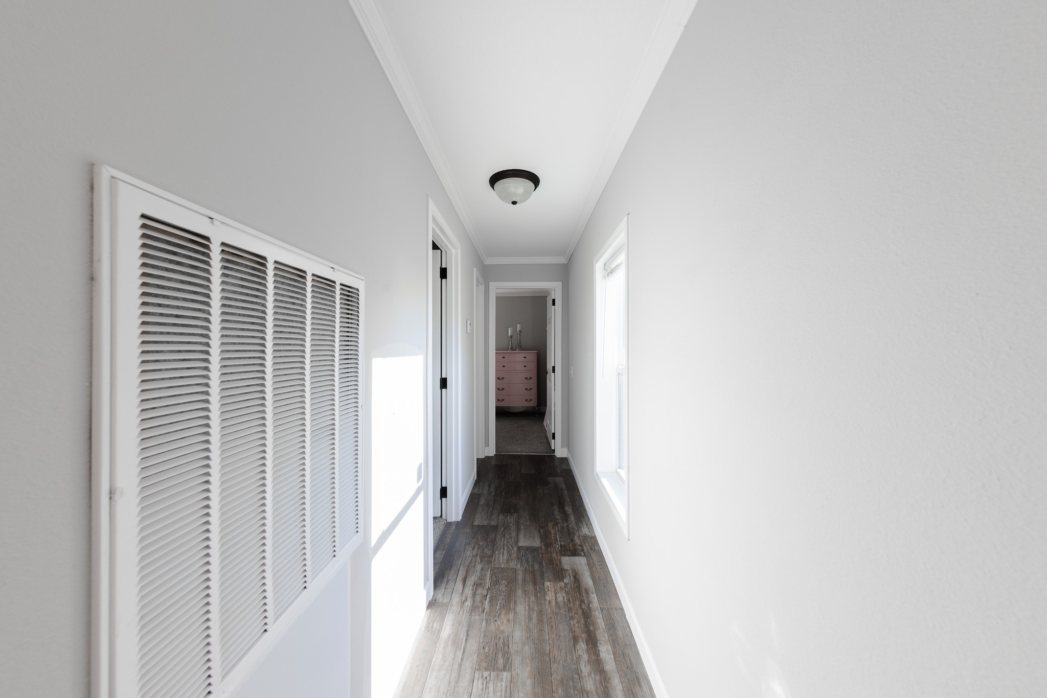 307 Swiss Colony Road Hohenwald, TN 38462 - Photo 16 of 35 a view of a hallway with wooden floor