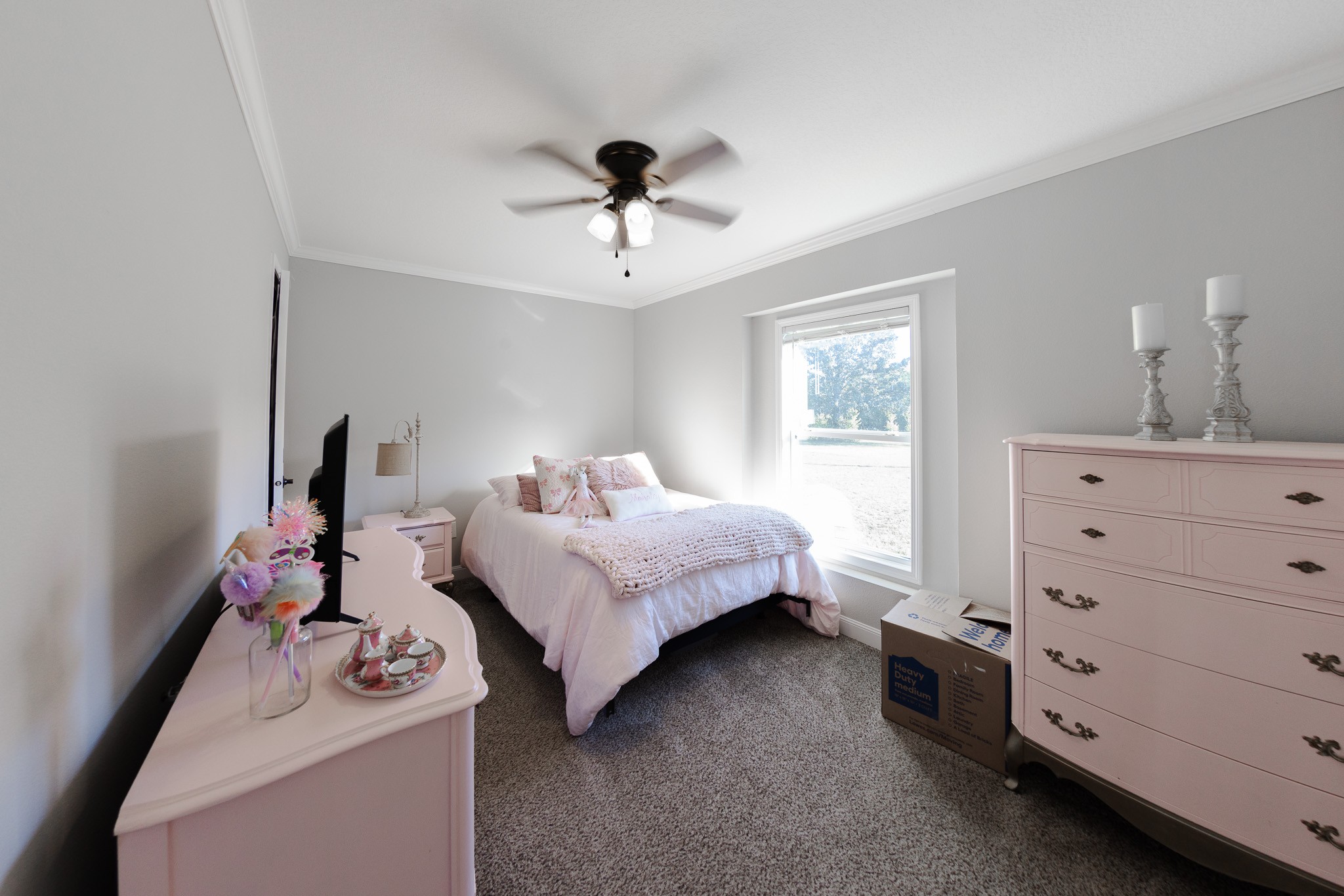 307 Swiss Colony Road Hohenwald, TN 38462 - Photo 21 of 35 a bedroom with a bed and a dresser