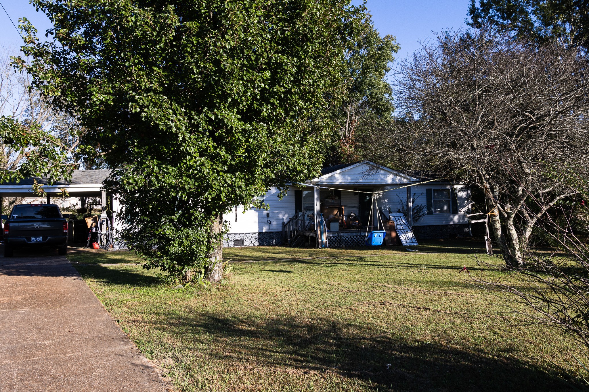 307 Swiss Colony Road Hohenwald, TN 38462 - Photo 30 of 35 a view of a house with swimming pool and sitting area