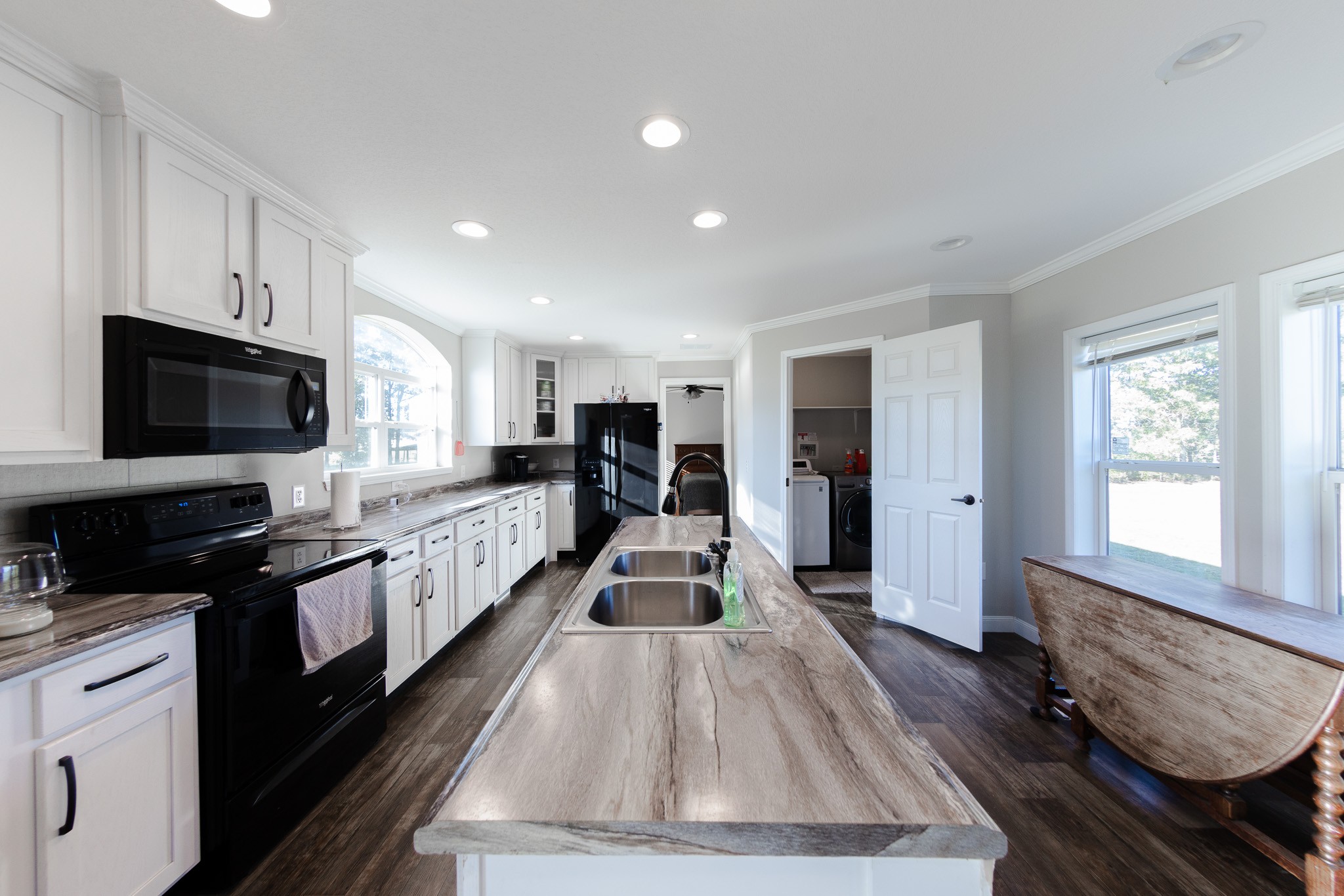 307 Swiss Colony Road Hohenwald, TN 38462 - Photo 8 of 35 a large kitchen with kitchen island granite countertop lots of counter top space