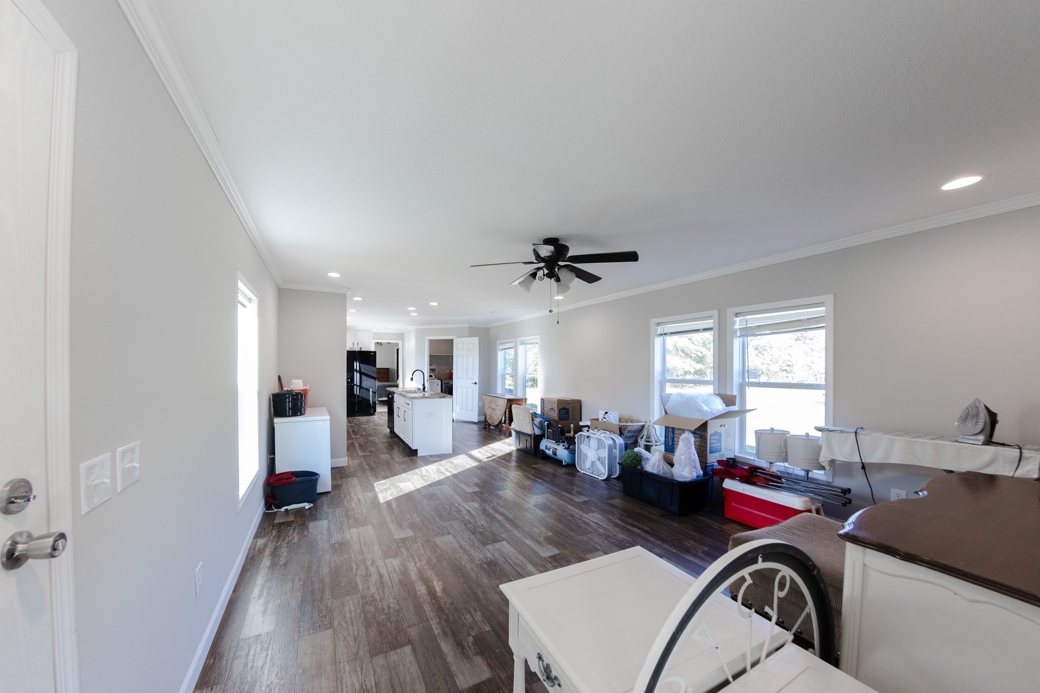 307 Swiss Colony Road Hohenwald, TN 38462 - Photo 9 of 35 a living room with furniture and a wooden floor