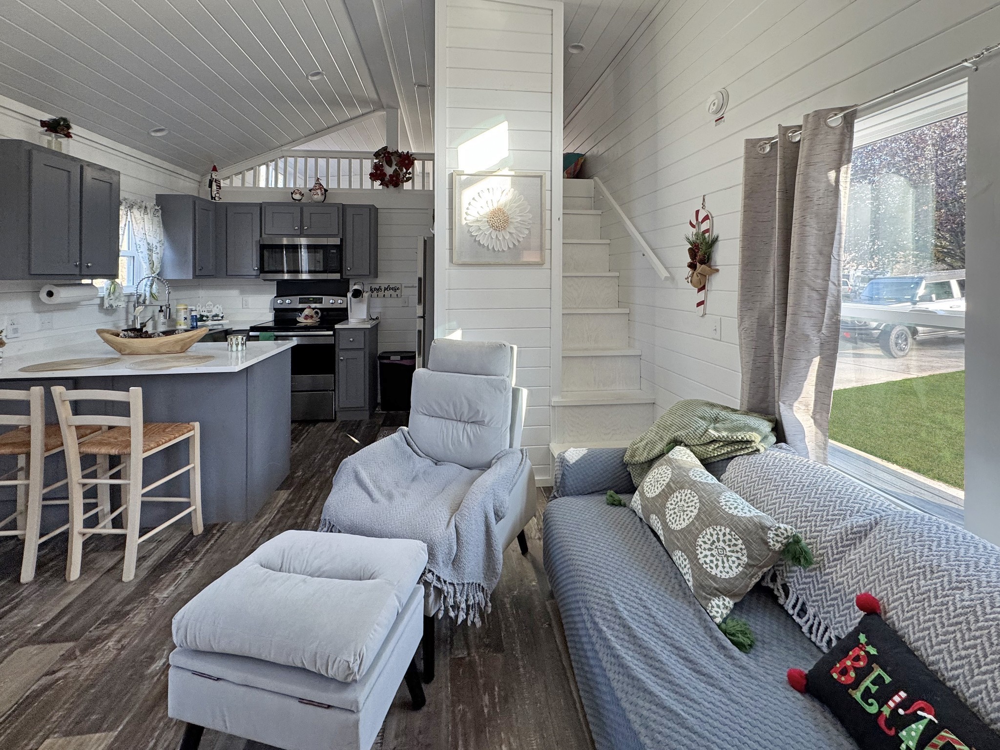 103 Thomas Road Dover, TN 37058 - Photo 6 of 16 a living room with furniture and a large window