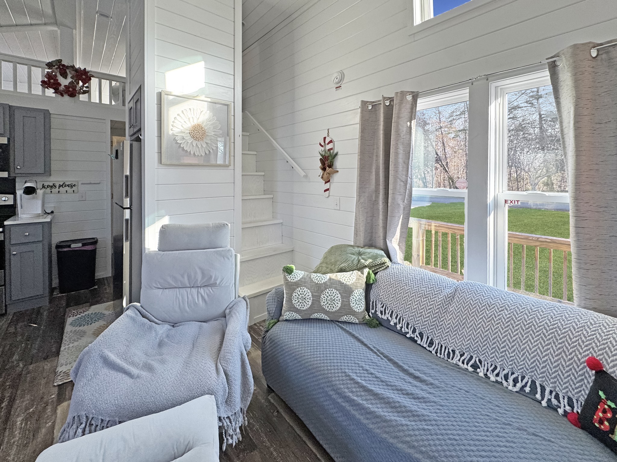 103 Thomas Road Dover, TN 37058 - Photo 7 of 16 a spacious bedroom with a bed and glass window