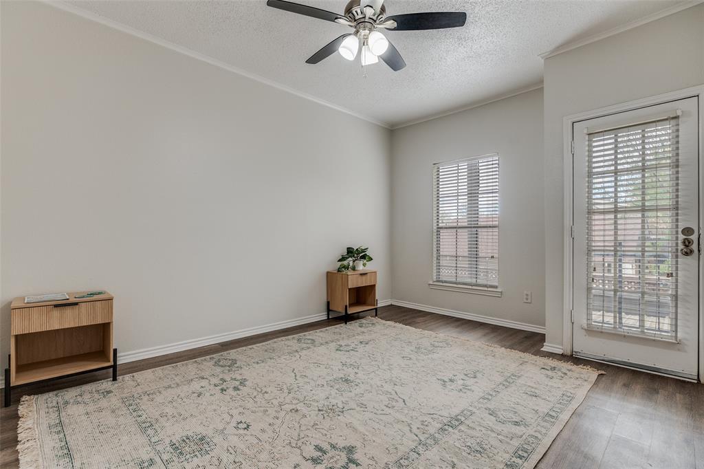 6003 Oram Street, Unit 107 Dallas, TX 75206 - Photo 11 of 23 a view of an empty room with a window